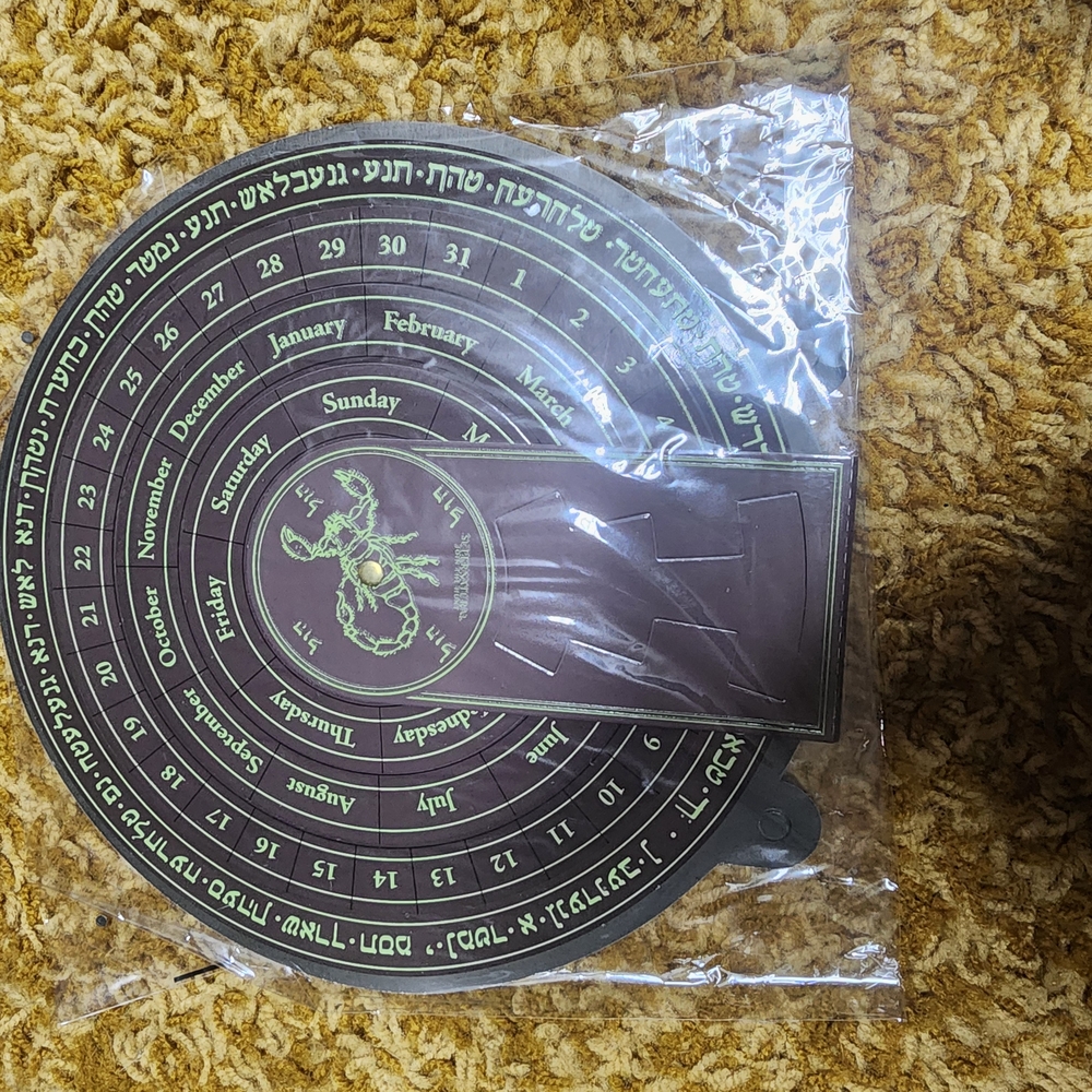 Brown Circular Calendar with Green Accents